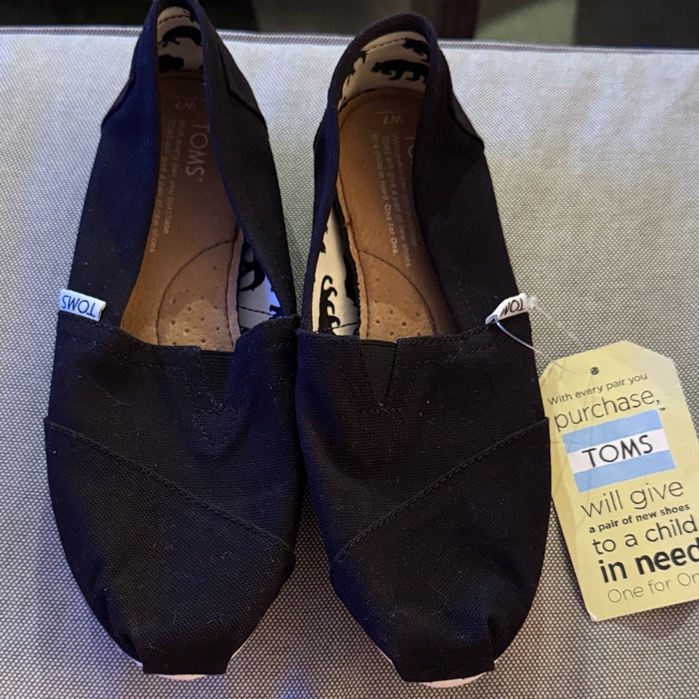 TOMS Classic Black Canvas Slip-Ons